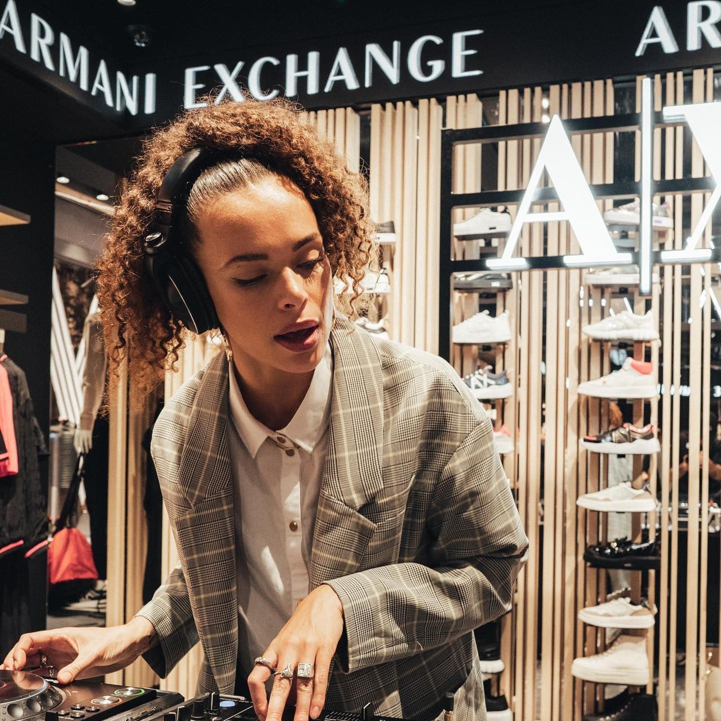 DJ performing in Armani Exchange store