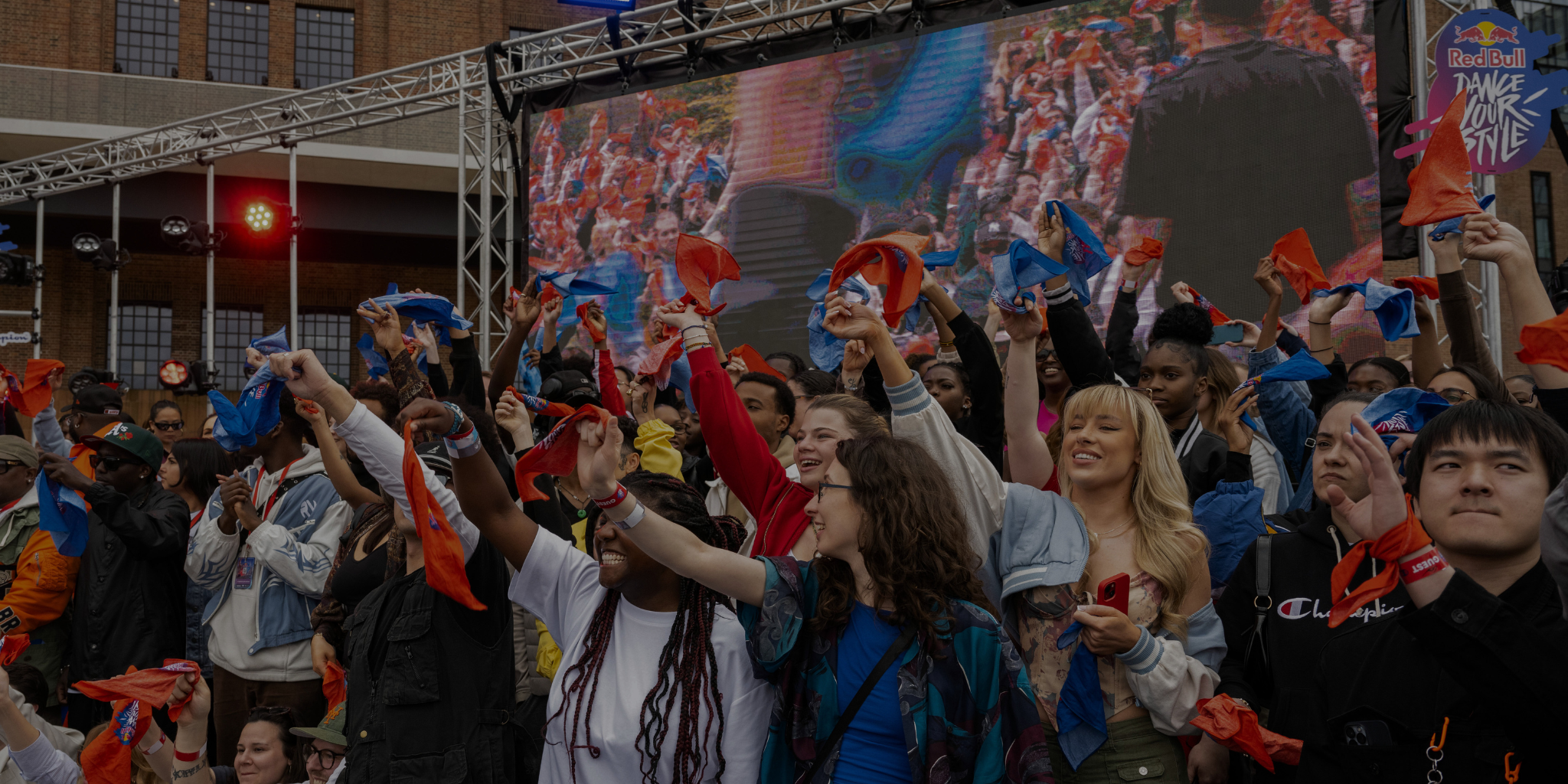 Crowd cheering at dance event