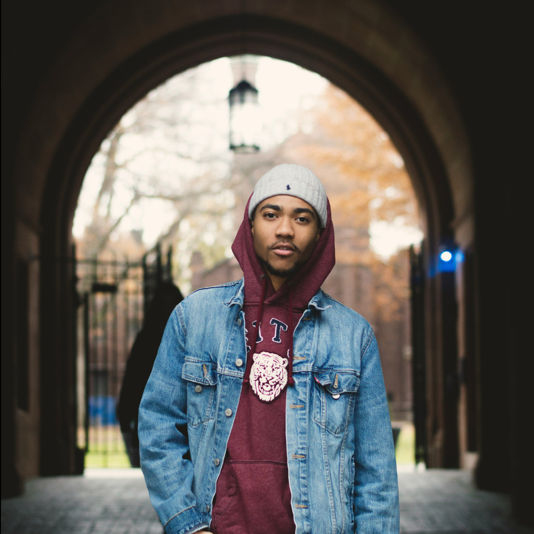 Man wearing college clothes