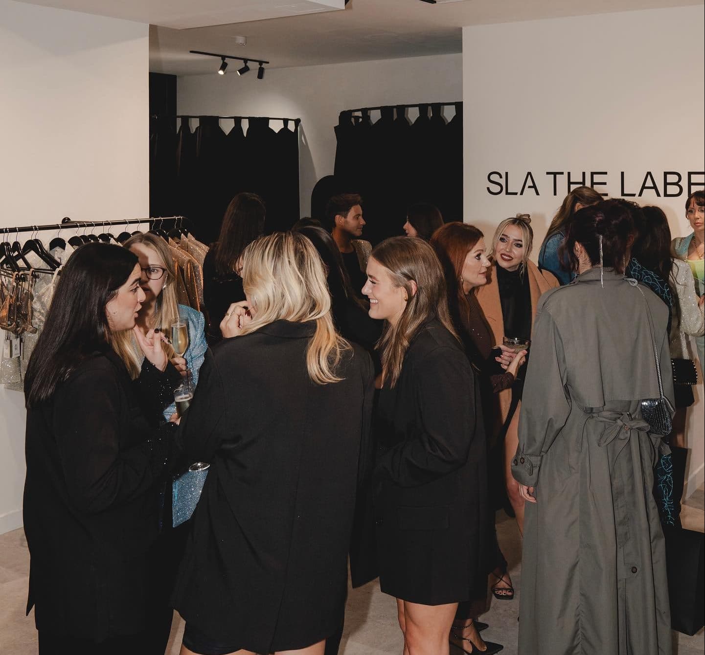 Fashion pop up attendees Event guests at fashion pop up